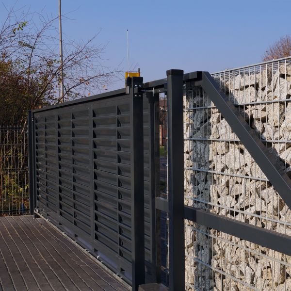 Black metal automatic gate installation completed by All About Garage Doors in Milwaukie OR