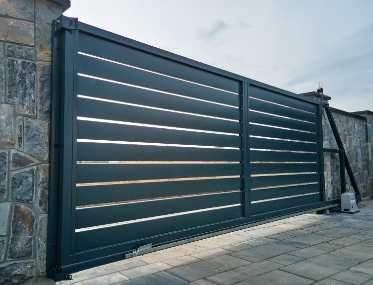 Newberg OR home get an automatic gate installation service by All About Garage Doors