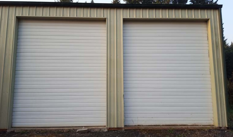 Dual garage doors that were worked on during an emergency garage door repair in Hillsboro OR by All About Garage Doors