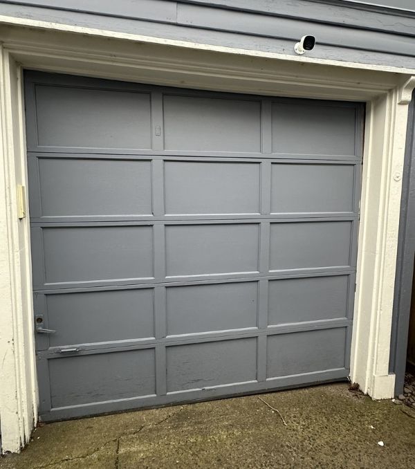 Broken garage door before and emergency garage door repair performed by All About Garage Doors in Portland OR