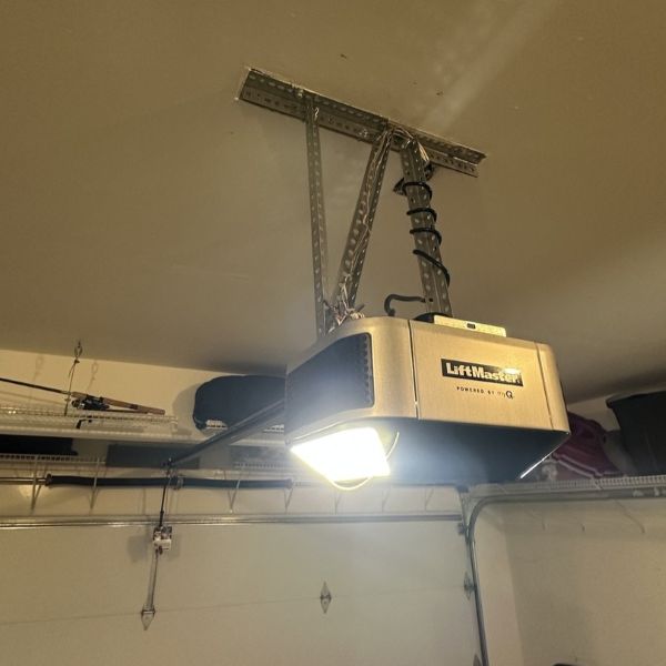 Garage door motor getting fixed by All About Garage Doors during an emergency garage door repair in Portland OR