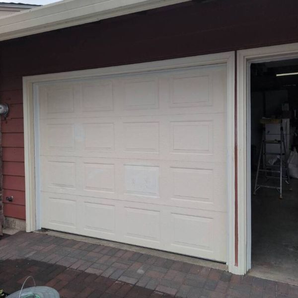 Broken garage door about to be repair by All About Garage doors in Oregon City OR during an emergency garage door service