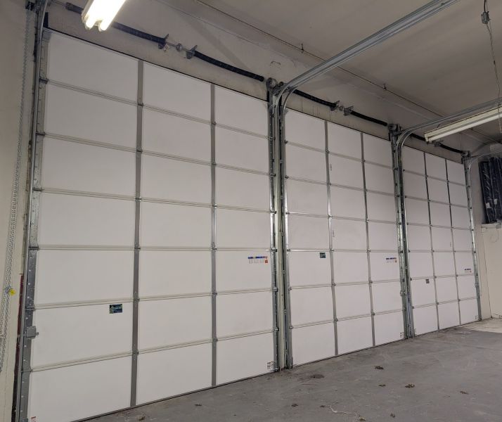 Three commercial garage door installation performed by All About Garage Doors in Tigard OR