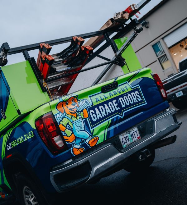 Picture of a work vehicle during garage door maintenance service by All About Garage Doors in Aloha OR