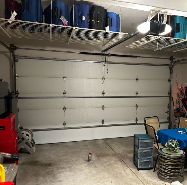 Inside a garage during garage door maintenance in Portland OR by All About Garage Doors