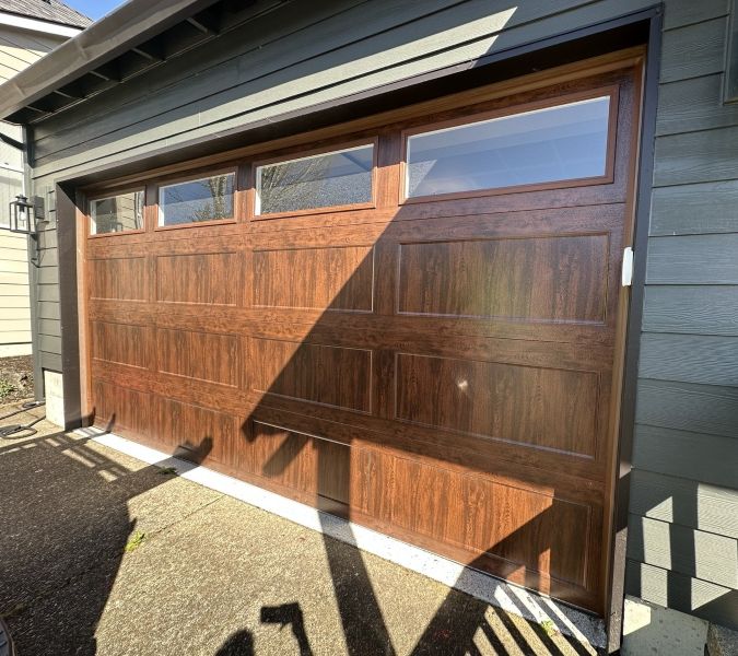 Beautiful wood garage door receives garage door maintenance from All About Garage Doors in Sherwood OR
