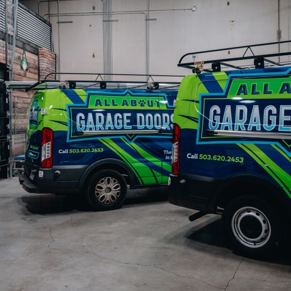 Service vans getting ready to respond for a garage door repair call by All About Garage Doors in Beaverton OR