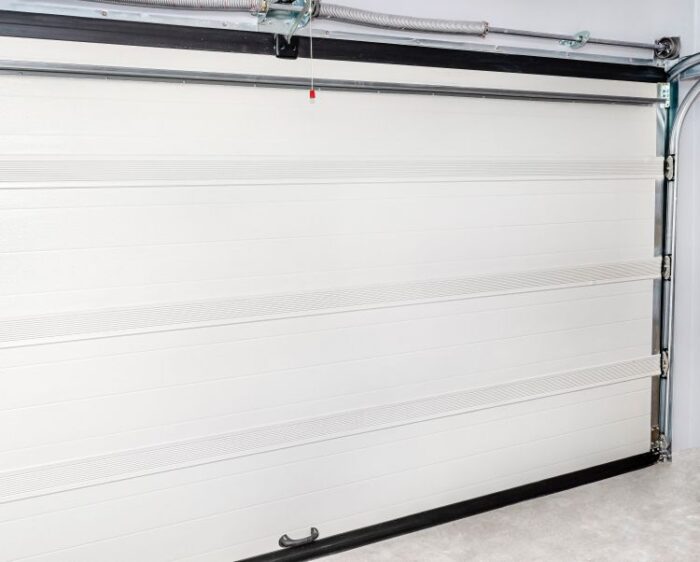 Inside of a garage after finalizing the garage door repair for Newberg OR home by All About Garage Doors