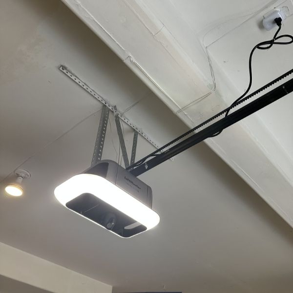 Door motor getting fixed by All About Garage Doors in Tualatin OR during a garage door repair service