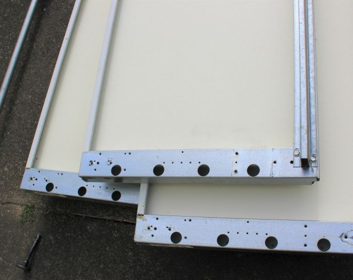 Getting panels ready for a garage door replacement in Beaverton OR by All About Garage Doors