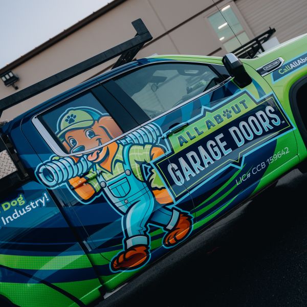 All About Garage Doors service truck leaving for a garage door replacement project in Forest Grove OR