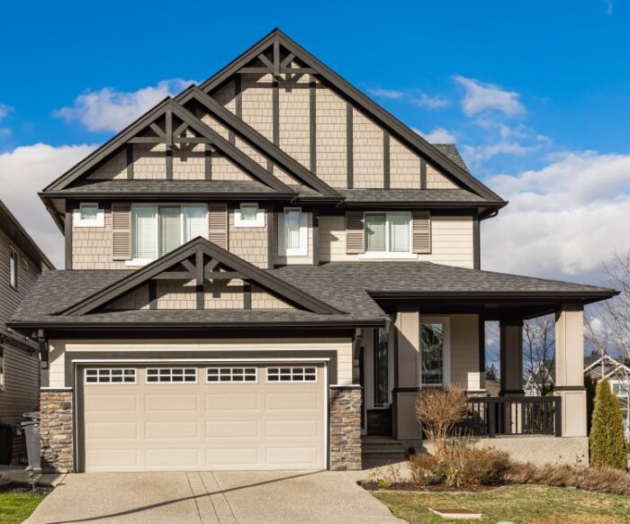 Lake Oswego OR home with a brand new garage door with windows from the garage door replacement services done by All About Garage Doors