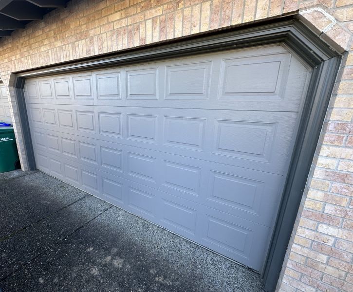Grey Garage Door Replaced On Brick Tigard Or Home By All About Garage Doors