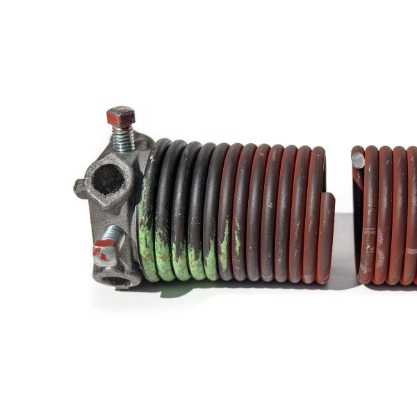 Broken garage spring removed from operation by All About Garage Door Technicians during garage spring replacement service in Beaverton OR