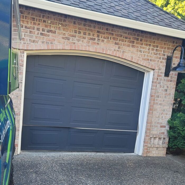 Broken Garage Door About To Be Fixed By All About Garage Doors In Beaverton Or