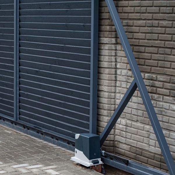 Black metal automatic gate installation in Wilsonville OR by All About Garage Doors