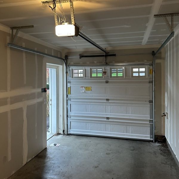 Inside of a Garden Home OR garage after an emergency garage door repair is executed by All About Garage Doors