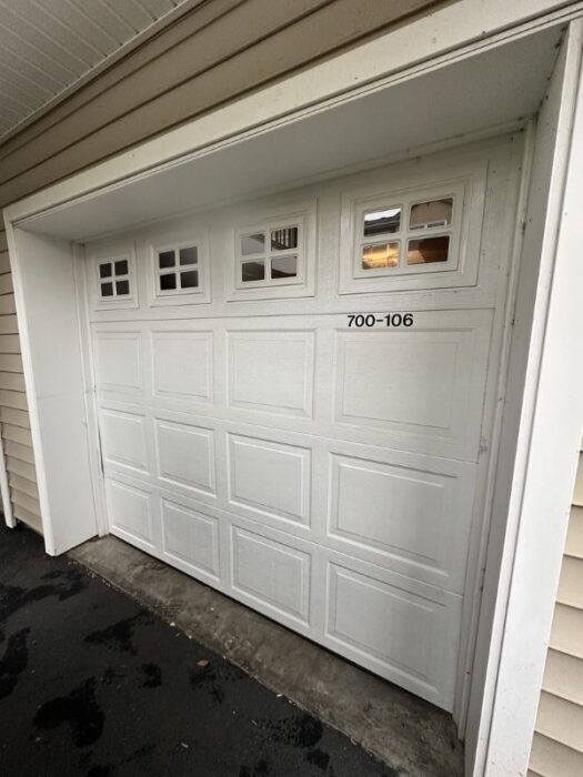 White garage door before getting an emergency garage door repair by All About Garage Doors in Multnomah Village Portland OR