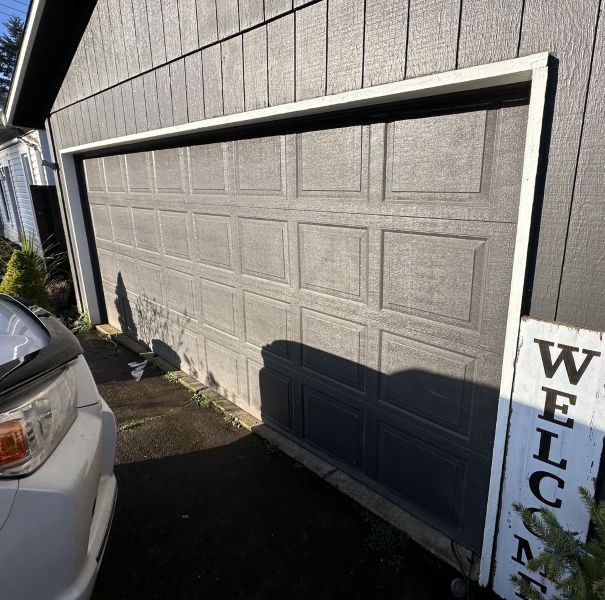 Dark grey garage door after receiving an emergency garage door service from All About Garage Doors in Wilsonville OR