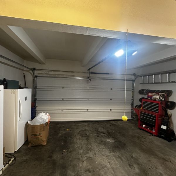 Multnomah Village Portland OR home receives a garage door repair by All About Garage Doors
