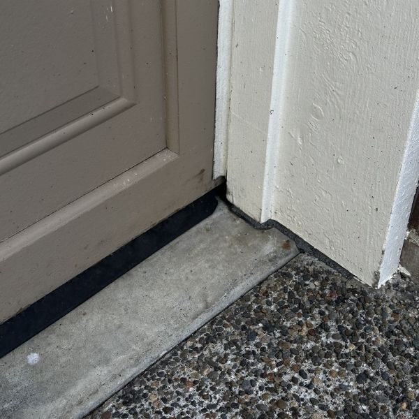 Weatherstripping replaced during a garage door repair by All About Garage Doors in Multnomah Village Portland OR