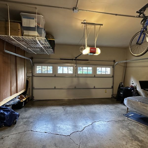 Garage door gets a garage spring replacement from All About Garage Doors in Raleigh Hills OR